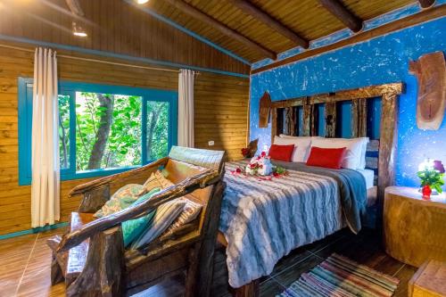 Cama ou camas em um quarto em Pousada Refúgio das Montanhas