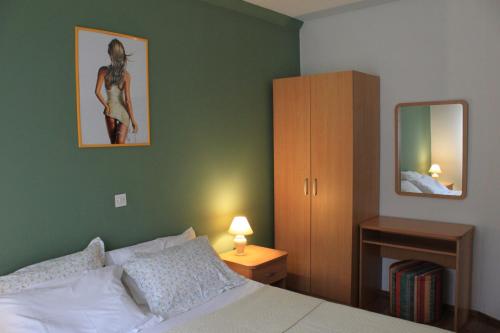 Кровать или кровати в номере Apartment Iva