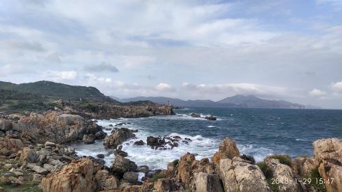 a view of the ocean with rocks in the water at Sun Sea Hotel in Quy Nhon