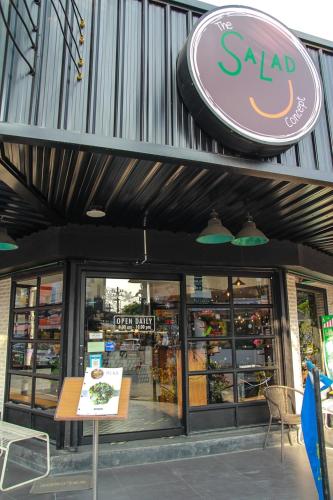 a sign on the front of a saad store at Chill Chill at Nimman in Chiang Mai