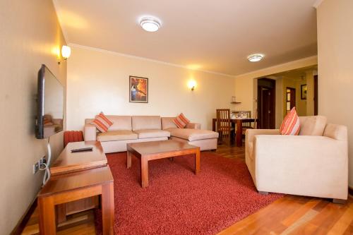 Χώρος καθιστικού στο Waridi Paradise Hotel and Suites