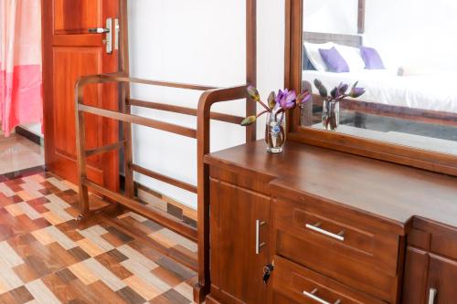 Postel nebo postele na pokoji v ubytování Mirissa Gold Rush Villa