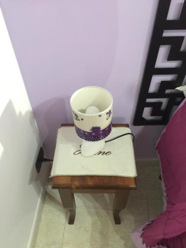 a table with a cup on top of it at Da Francesca in Scilla
