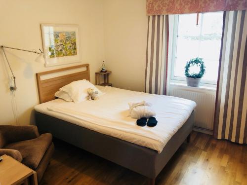 Postel nebo postele na pokoji v ubytování Balingsholm