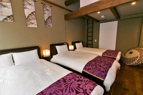 Lova arba lovos apgyvendinimo įstaigoje Kyo-machiya Flower Inn Hanayo