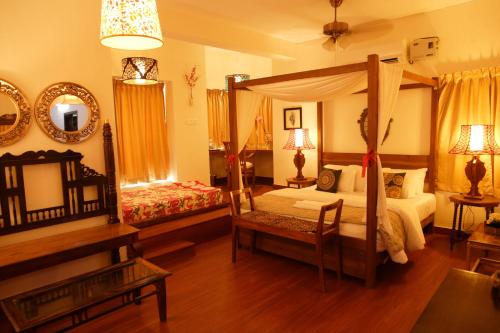 Ein Bett oder Betten in einem Zimmer der Unterkunft Hotel Villa Highnest - Oragadam -Sriperumbudur