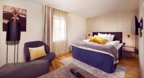 Tempat tidur dalam kamar di Clarion Collection Hotel Bryggeparken