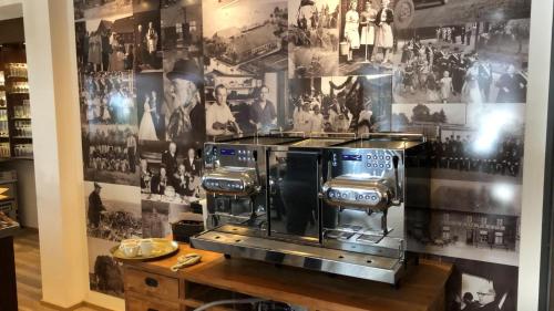 a black and white picture of a kitchen on a wall at Das Gasthaus am Reichswald in Kranenburg