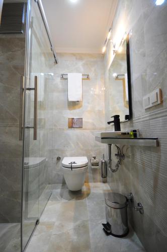 Kúpeľňa v ubytovaní Ottopera Hotel