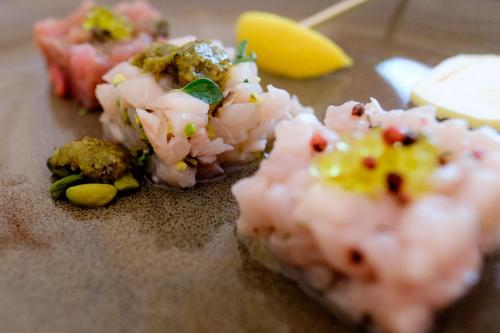 a close up of some food on a table at Appartamenti nelle Vigne in Capriva del Friuli