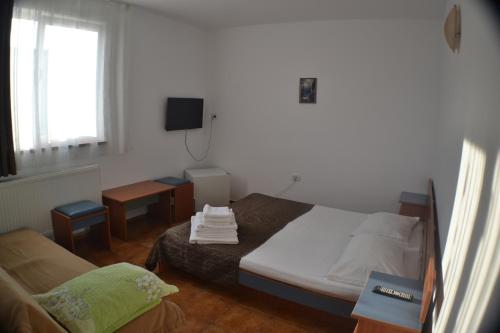 TV a/nebo společenská místnost v ubytování Casa Omer