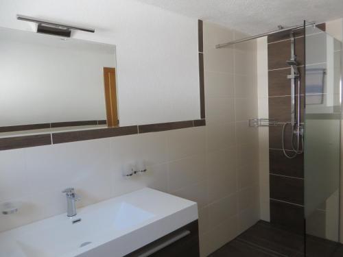 Kúpeľňa v ubytovaní Haus Daheim