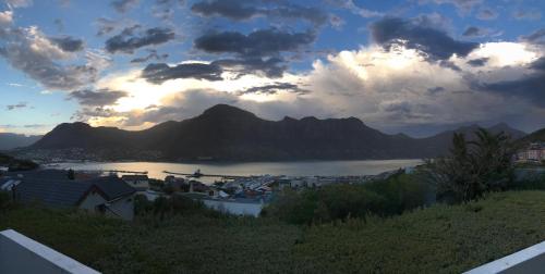 a view of a body of water with mountains at The Loft in Hout Bay