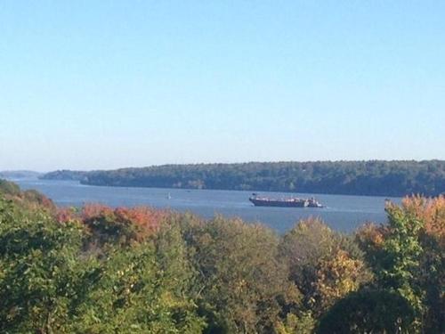 a large boat in a large body of water at Renwick Clifton House B&B in Saugerties