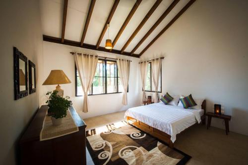 Katil atau katil-katil dalam bilik di Rest Pause Rainforest Retreat