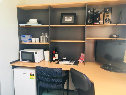 Kuchyň nebo kuchyňský kout v ubytování Coonawarra Ensuite Unit C