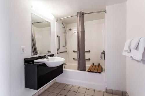 a bathroom with a sink and a shower at Motel 6-El Paso, TX - East in El Paso