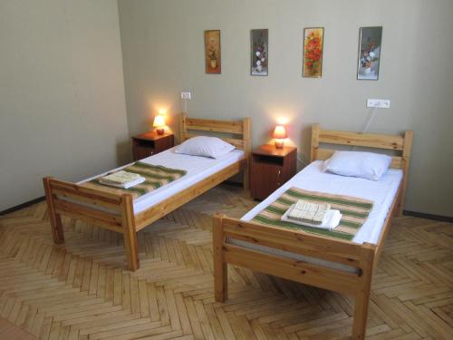 Кровать или кровати в номере Хостел Ярослав