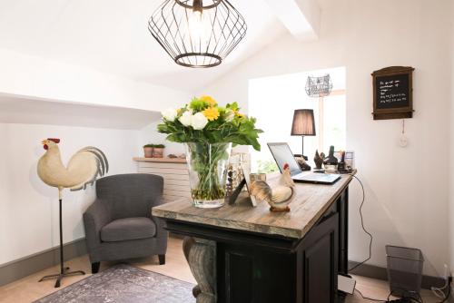 Coin salon dans l'établissement B&B De Hanewijkhoeve