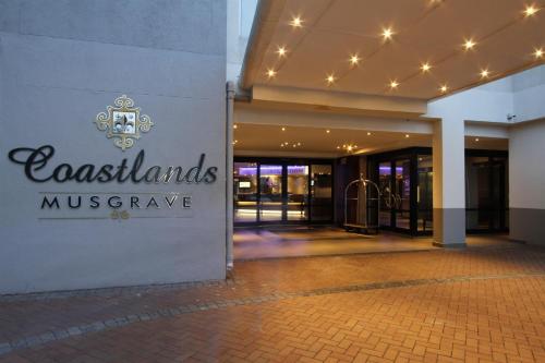a building with a sign that readsosslandsmus preserve at Coastlands Musgrave Hotel in Durban