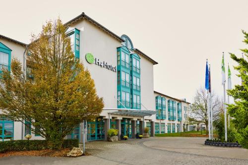 a rendering of the hilton hotel at H+ Hotel Limes Thermen Aalen in Aalen