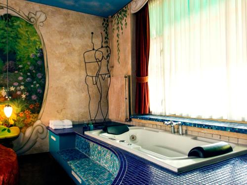 Ванна кімната в Hotel de Plataan Delft Centrum