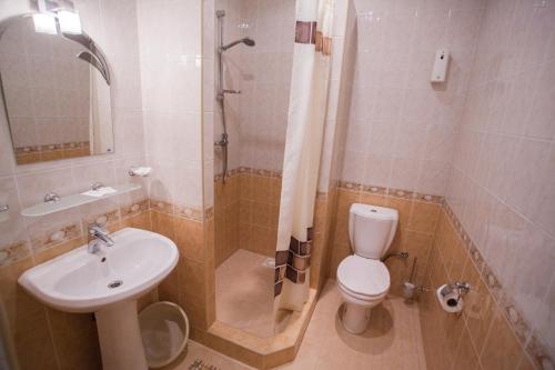 Ванная комната в Dolce Vita Hotel