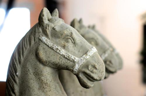 a stone statue of a horse statue at 3 Paardekens - City Centre Hotel in Mechelen