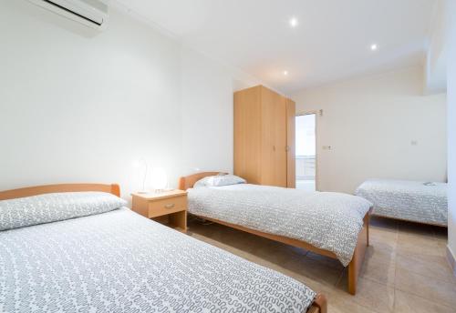 Ένα ή περισσότερα κρεβάτια σε δωμάτιο στο Apartment Fortuna