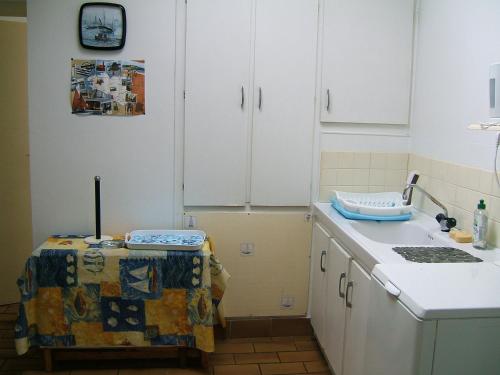 Η κουζίνα ή μικρή κουζίνα στο Appartements Tonton Jo