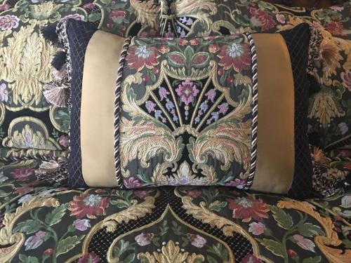 a close up of a purse on top of a blanket at Renwick Clifton House B&B in Saugerties