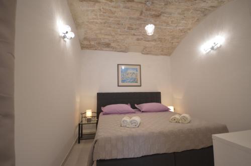 Ένα ή περισσότερα κρεβάτια σε δωμάτιο στο Castello rezidence Korcula 2