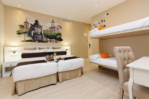 Postel nebo postele na pokoji v ubytování Grupotel Mayorazgo