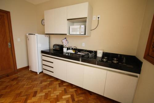 A kitchen or kitchenette at Casa Antunes