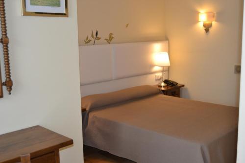 Cama o camas de una habitación en Hotel Nuevo Cachalote