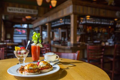 a plate of food on a table in a restaurant at McMenamins Gearhart Hotel in Gearhart