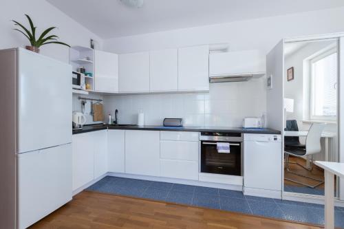 Η κουζίνα ή μικρή κουζίνα στο Apartment Kamienica Lęborska