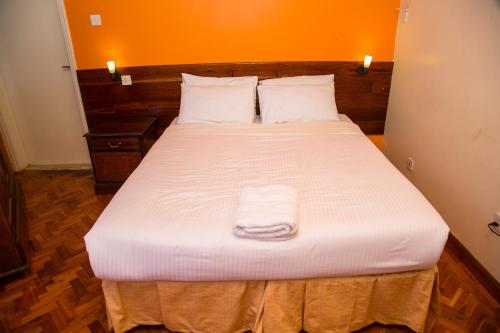 Postel nebo postele na pokoji v ubytování Thayu Farm Hotel