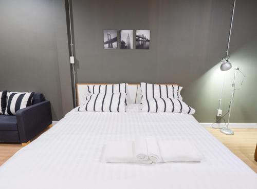 Krevet ili kreveti u jedinici u okviru objekta Pann Residence