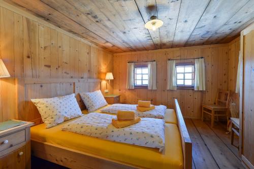 En eller flere senge i et værelse på Haus Matschwitz