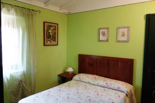 B&B Casale Dorando tesisinde bir odada yatak veya yataklar