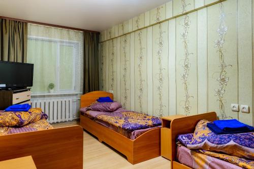 Кровать или кровати в номере Apartment TwoPillows on Lomonosova 9