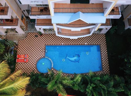 Pemandangan kolam renang di TreeHouse Blue Hotel & Serviced Apartments atau berdekatan