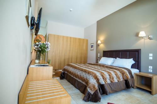 Forest Suites Boutique Hotelにあるベッド