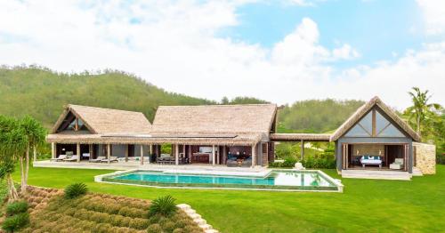an image of a house with a swimming pool at Six Senses Fiji in Malolo