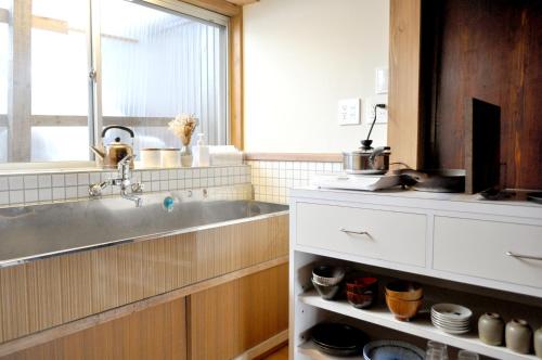 Gallery image of Guest House Takazuri-KITA in Nanto