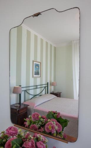 Una cama o camas en una habitación de Hotel Bianchi Nicola
