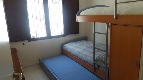 Postel nebo postele na pokoji v ubytování Casa al borde del mar