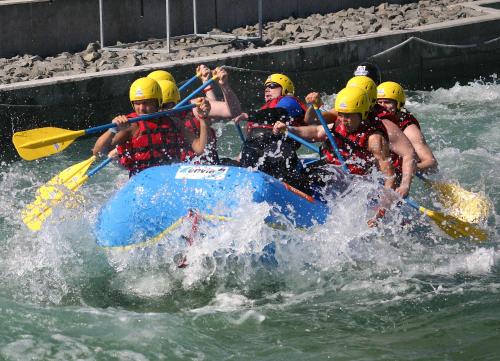 a group of people in a raft in the water at Ferienhaus Kaiserhof in Markkleeberg