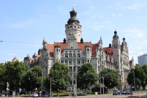 a large building with a tower on top of it at Ferienhaus Kaiserhof in Markkleeberg